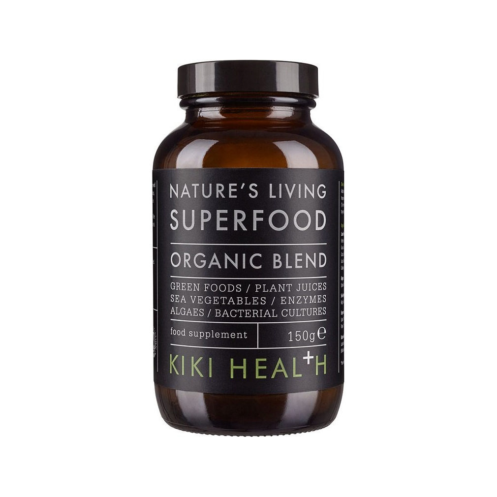 Superfood-tillskott i brun glasflaska med svart lock och etikett